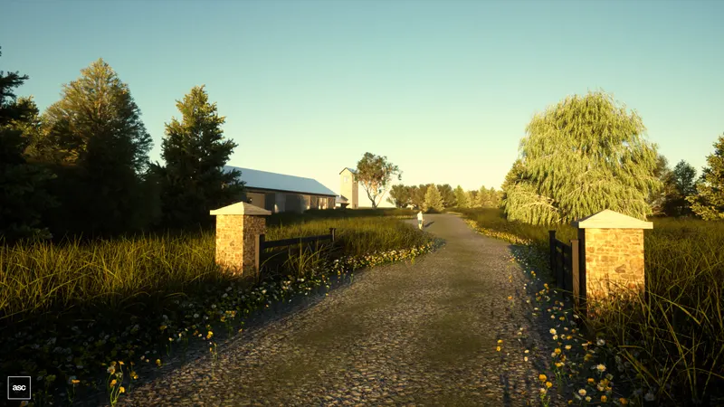 Gravel drive through stone gateposts toward a long shed and square tower.