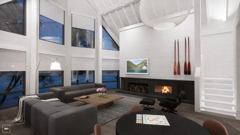 White vaulted living room with a long black fireplace and tall windows to the lake.