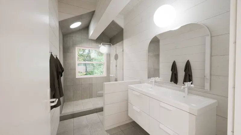 White-panelled bathroom with a shaped mirror, double basin and tiled shower.