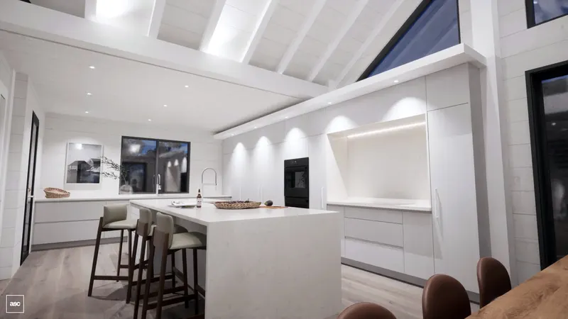 White kitchen island beneath white-painted ceiling beams and clerestory glazing.
