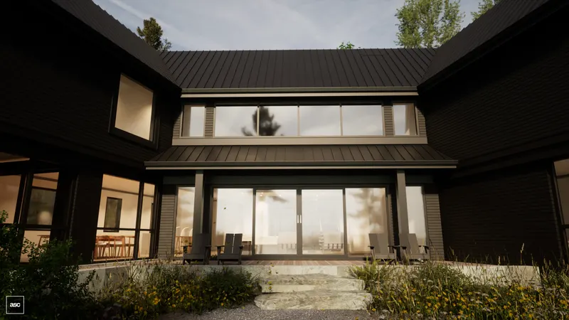 Sheltered courtyard with Adirondack chairs, stone steps and wildflowers beside broad glazed doors.