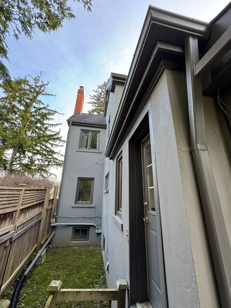 Existing side walls, windows and projecting rear room.