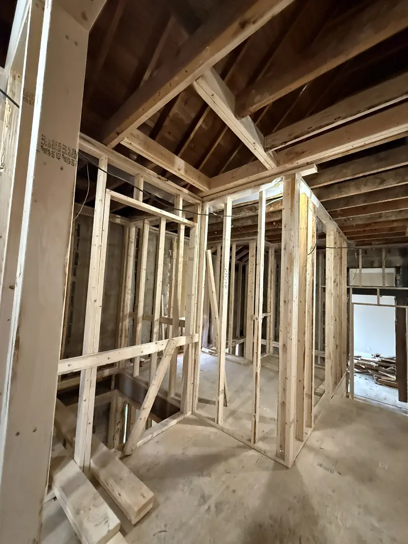 New timber partitions around the stair opening.