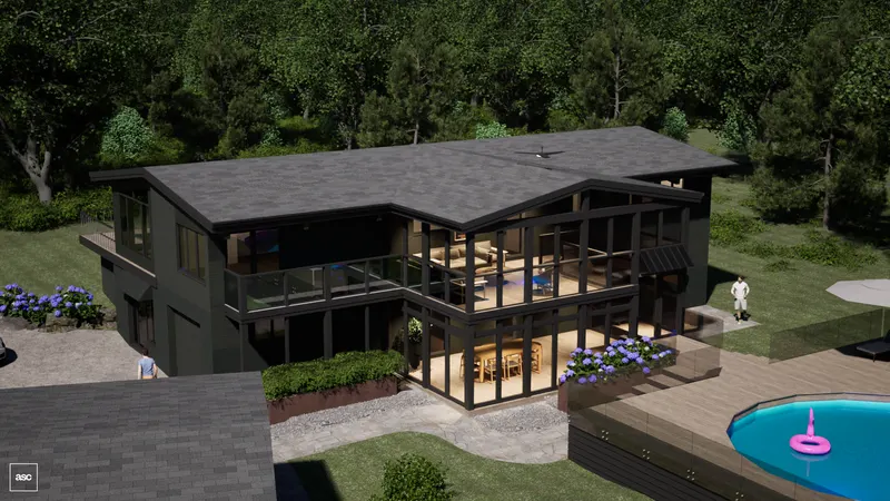 Elevated view of the guest house, broad roof and pool deck among trees.