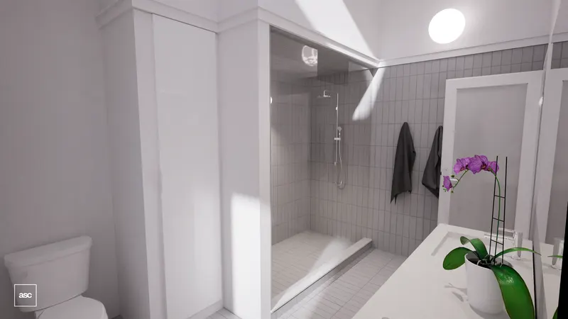 White bathroom with a tiled walk-in shower, pale vanity and orchid.