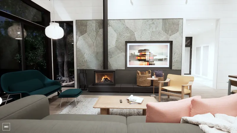 Stone fireplace wall and green chairs beside tall lake-facing glazing.