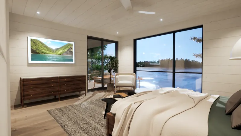 White-panelled bedroom with a timber bed and broad doors toward the lake.