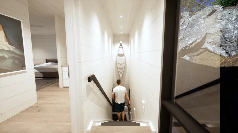 White-panelled stair with a dark handrail and canoe-shaped wall shelf.