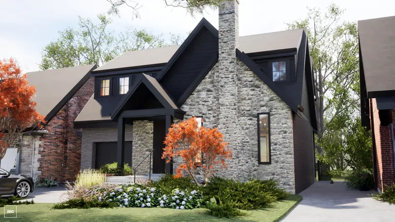 Stone-fronted house with dark shingled gables and a red maple beside the entrance.