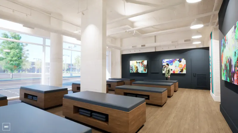 West studio — treatment benches beside tall windows and a dark wall.
