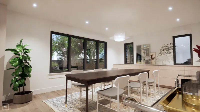 Timber dining table beside a broad black-framed garden window.